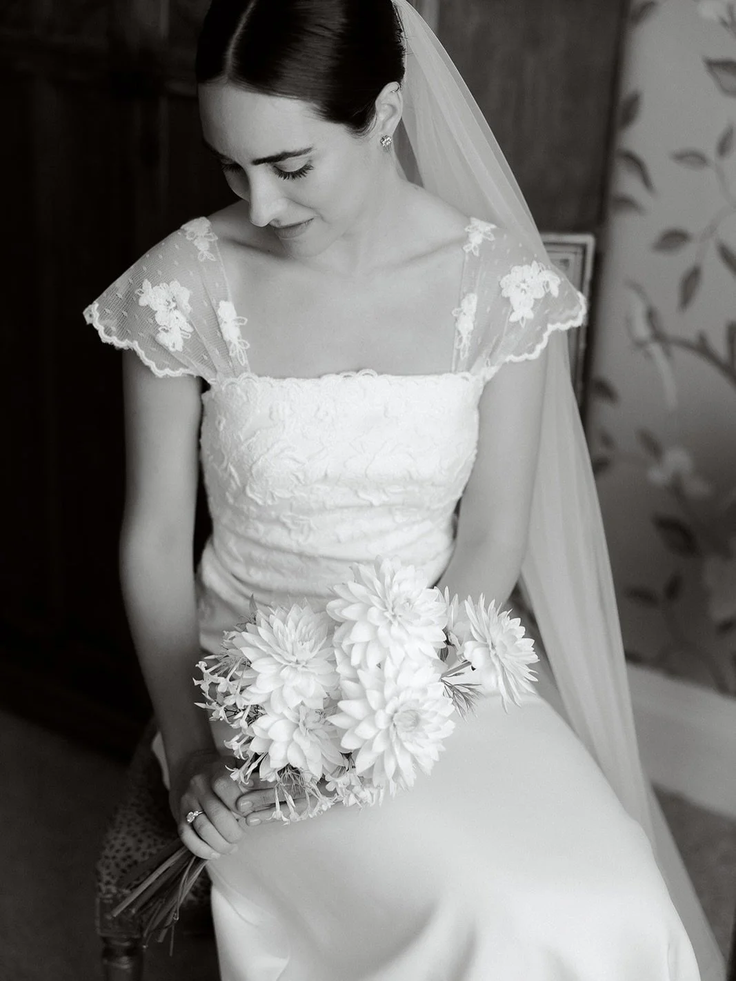 A moment for Andrea's bridal bouquet...

White dahlia "Onesta" symbolising honesty, elegance and tranquility and jasmine symbolising purity and sensuality, adding sensory depth with its heady perfume.  A fusion of English country garden and