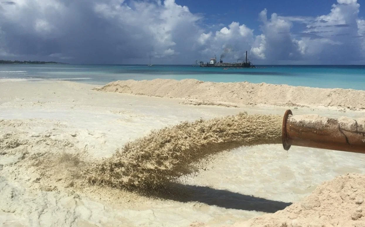 Sand being pumped ashore during land reclamation works in Tuvalu.