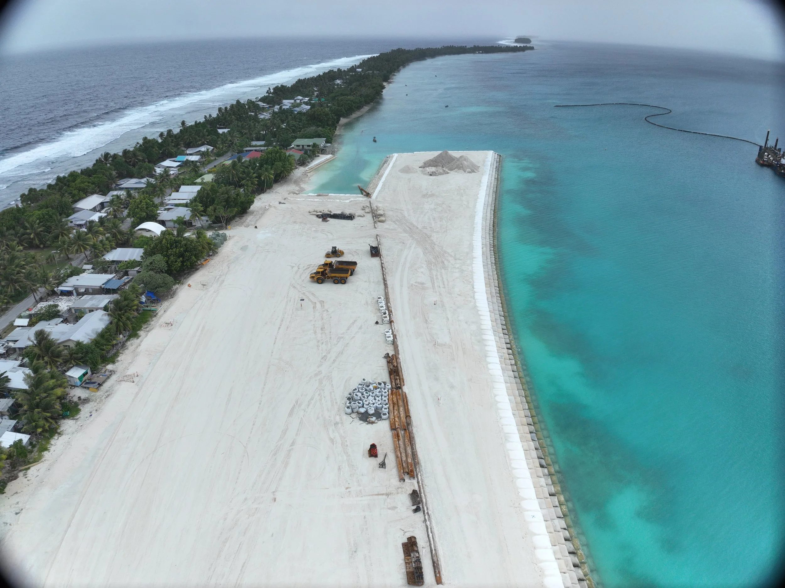 Aerial view along the TCAP1A raised reclamation and coastal protection works on Fogafale Island, Tuvalu.