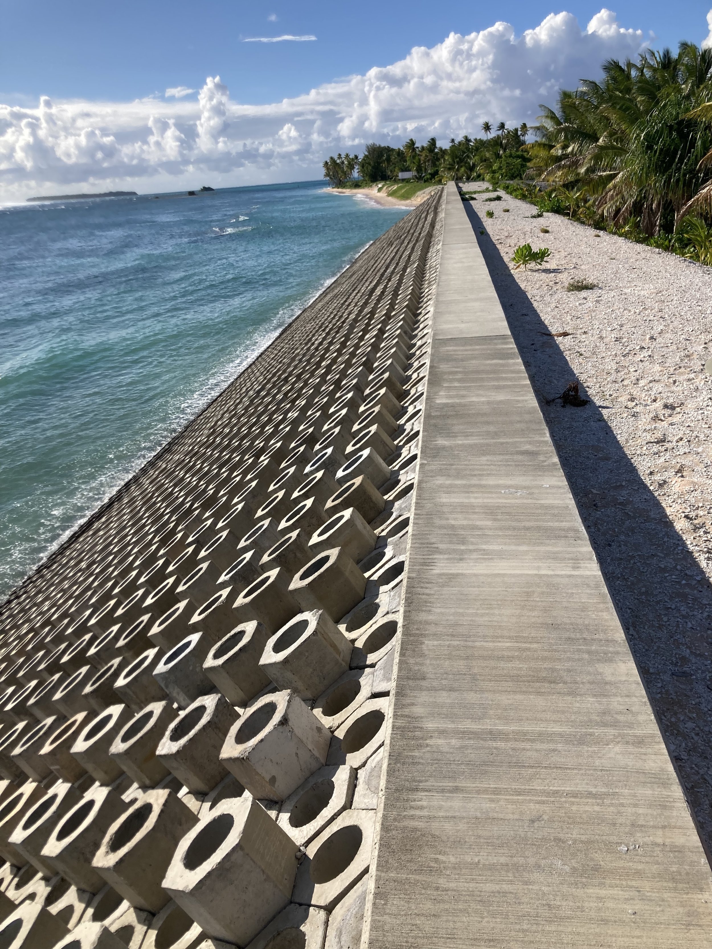 Engineered concrete coastal protection structure along the shoreline of Nanumea, Tuvalu.