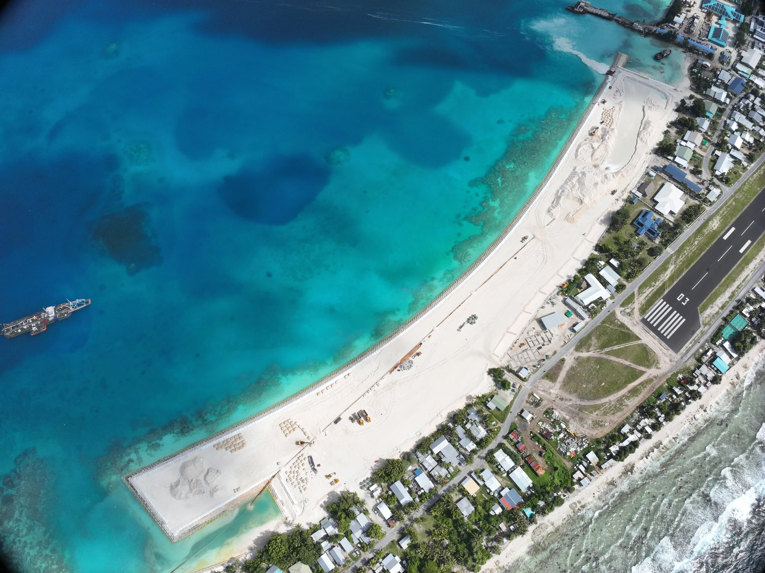 Aerial view of TCAP1A coastal reclamation works along the lagoon shoreline of Fogafale, Funafuti, Tuvalu.