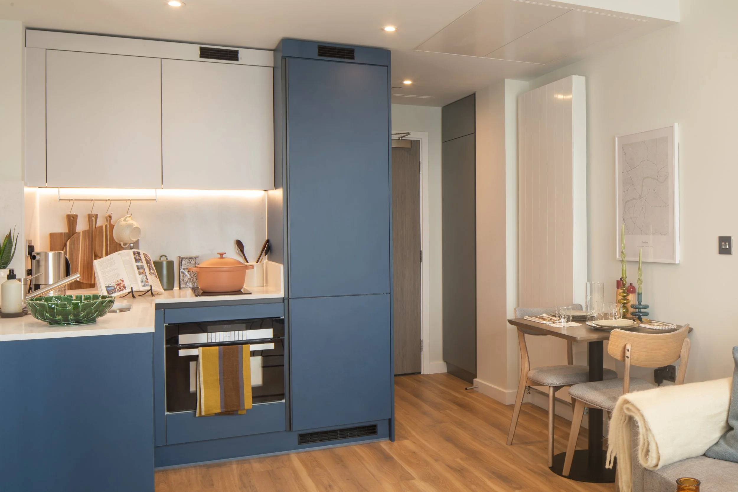 1 Bed Tyrolean Blue Kitchen Dining area.jpg