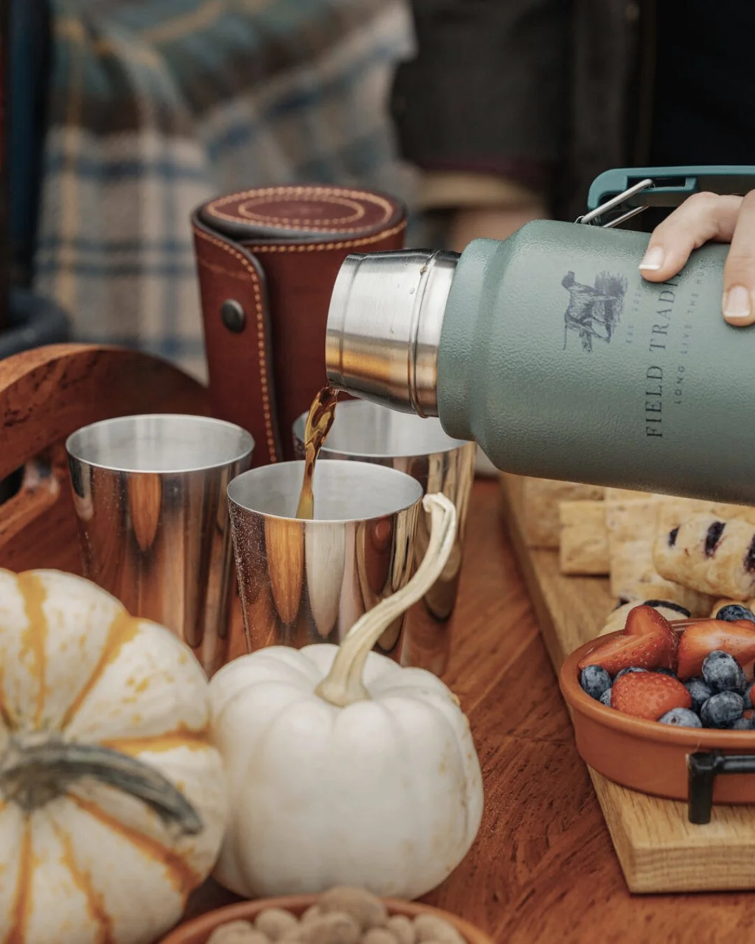 A quiet moment from Chloe&rsquo;s US shoot for @fieldtraditions - pumpkins in the frame, coffee close by, and a brand story unfolding through the lens.⁠
A little seasonal magic before we share more from this campaign soon.⁠
⁠
#TheBrandMuse #FieldTrad