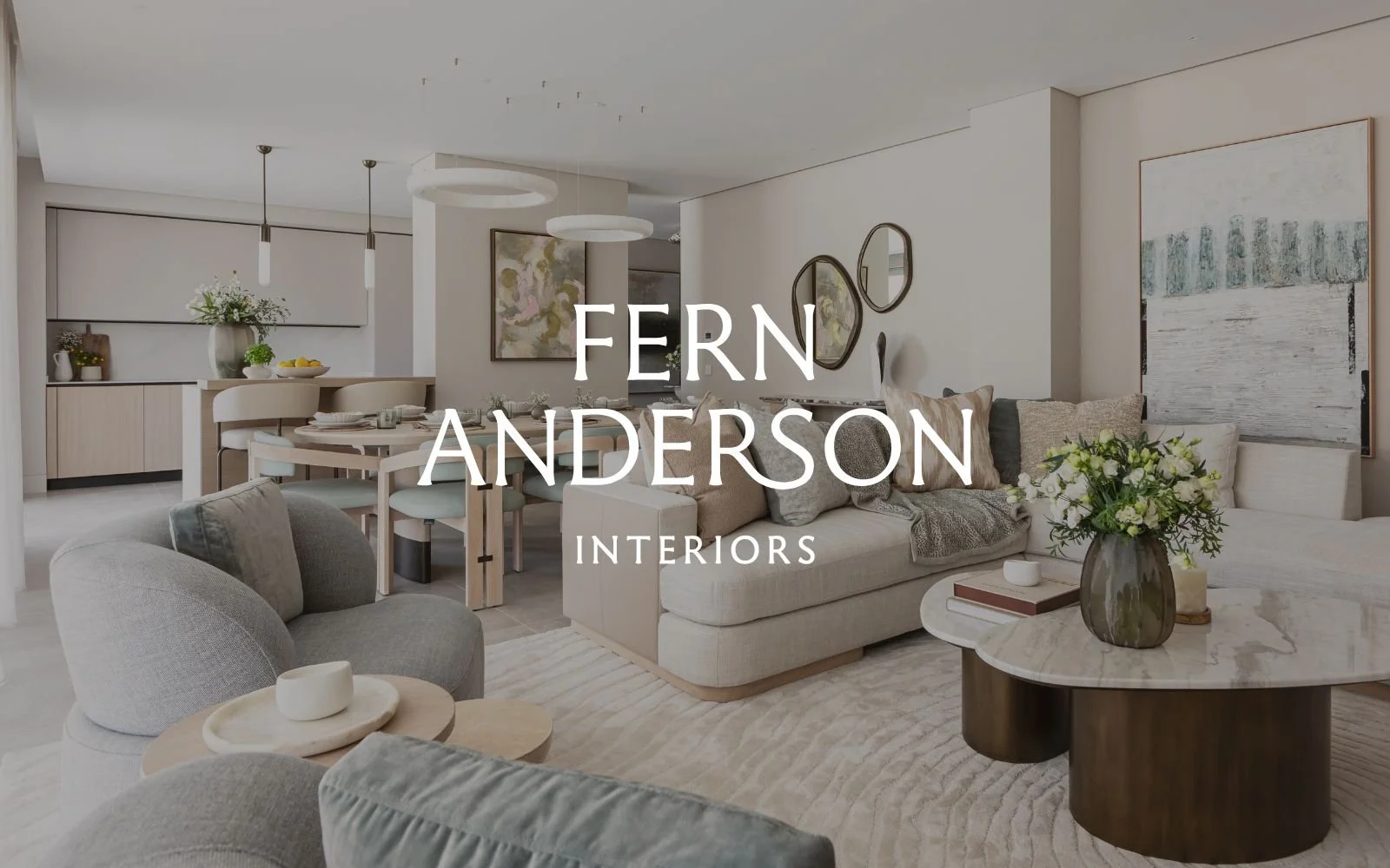 Fern Anderson Interiors brand presentation featuring a bespoke kitchen interior with marble surfaces and pendant lighting, with the studio wordmark overlaid as part of the visual identity designed by The Brand Muse.