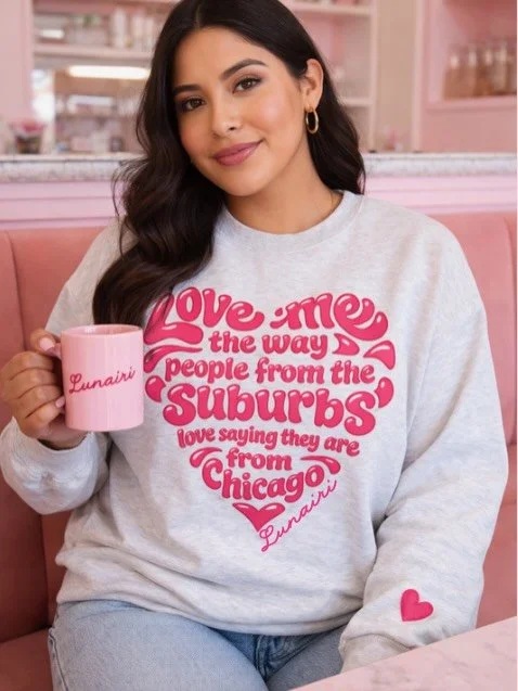 Say it with your chest. This hoodie features our iconic phrase &ldquo;Love Me the Way Suburban People Love Saying They&rsquo;re From Chicago,&rdquo; blending humor, comfort, and Chicago attitude into one must-have piece. Ultra-cozy and effortlessly c