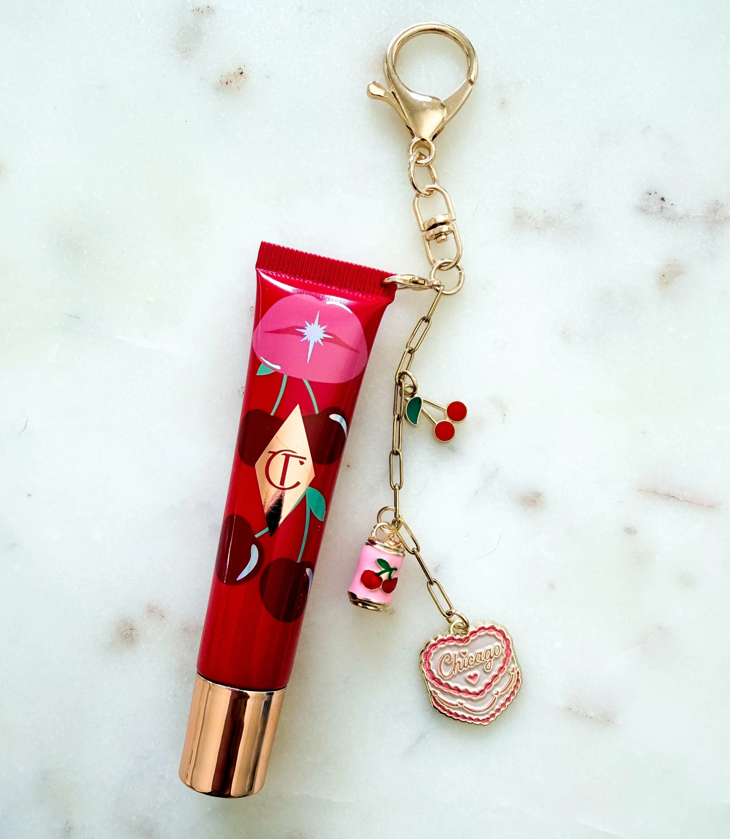 Before anyone asks&hellip; the lip gloss isn&rsquo;t included. 😅 The charm? That&rsquo;s the star of the show. 🍒 all of these charms will be available for anyone that books the Lunairi Mobile Charm Bar. September calendar is now open #charlottetilb