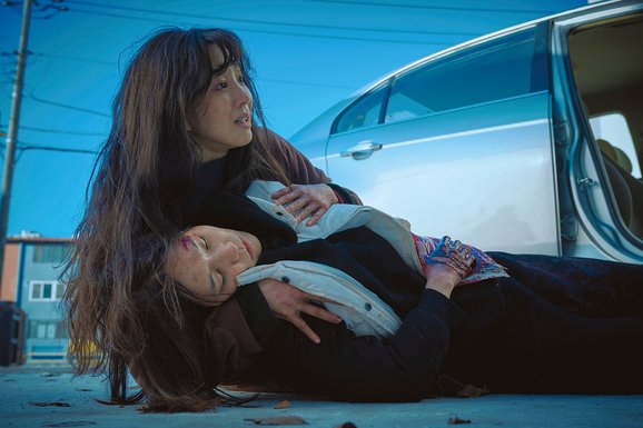 THE WOMAN IN THE WHITE CAR