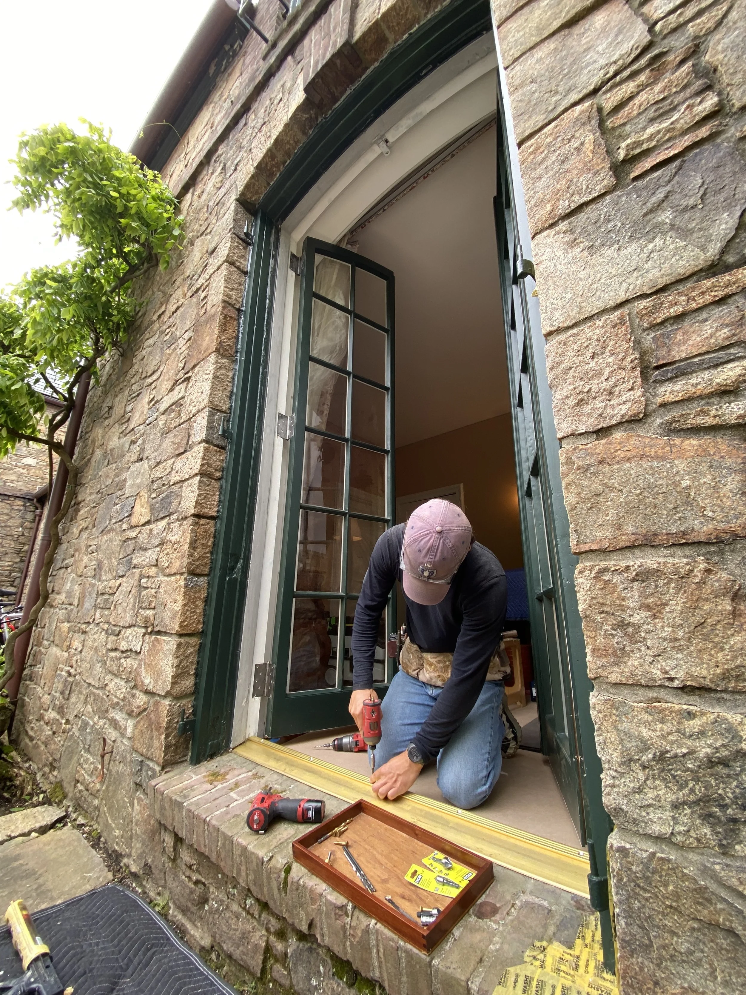 Door Overhaul with Custom Bronze Weatherstripping