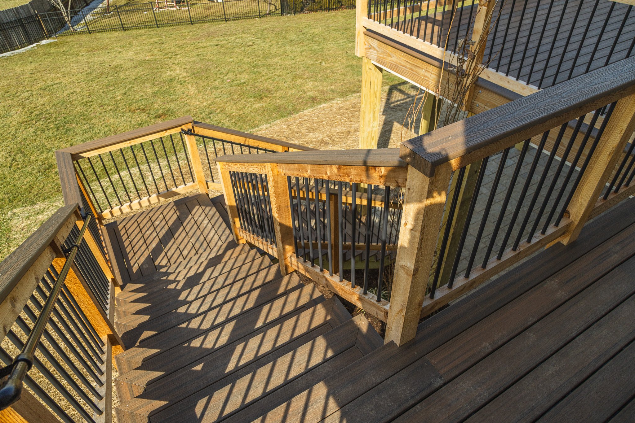 This custom two story deck was designed for function and flow, with wide stairs, durable composite decking, and a hybrid railing.

If your backyard feels like unused space, it might just need the right plan. Call us today to get started!

#OutdoorSpa