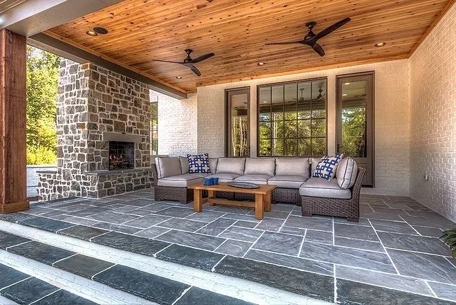 Under deck patio space with fireplace