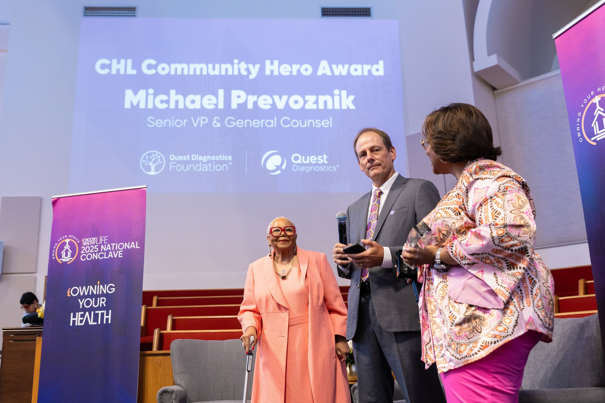 Quest Diagnostics Senior VP & General Counsel Michael Prevoznik receives the CHL Community Hero Award