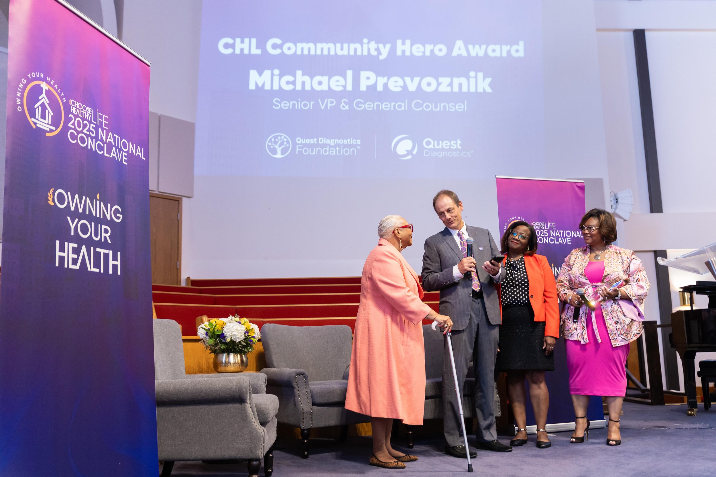 Quest Diagnostics Senior VP & General Counsel Michael Prevoznik receives the CHL Community Hero Award