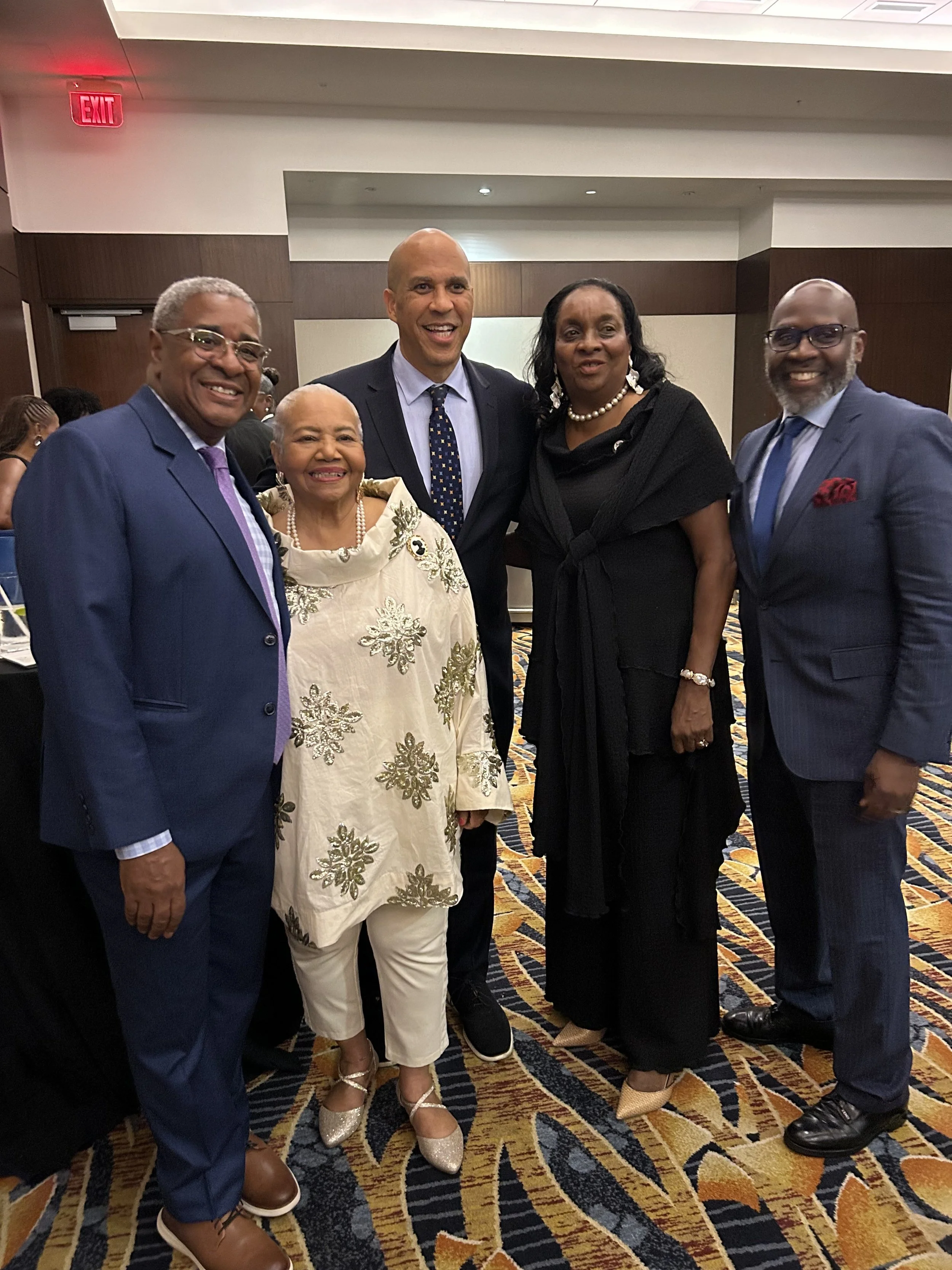 (from left to right) NMAC President Harold Phillips, CHL Founder Debra Fraser-Howze, Sen. Cory Booker, Chief of Operations at AACEO Dee Bailey, and AACEO President Rev. Robert Waterman