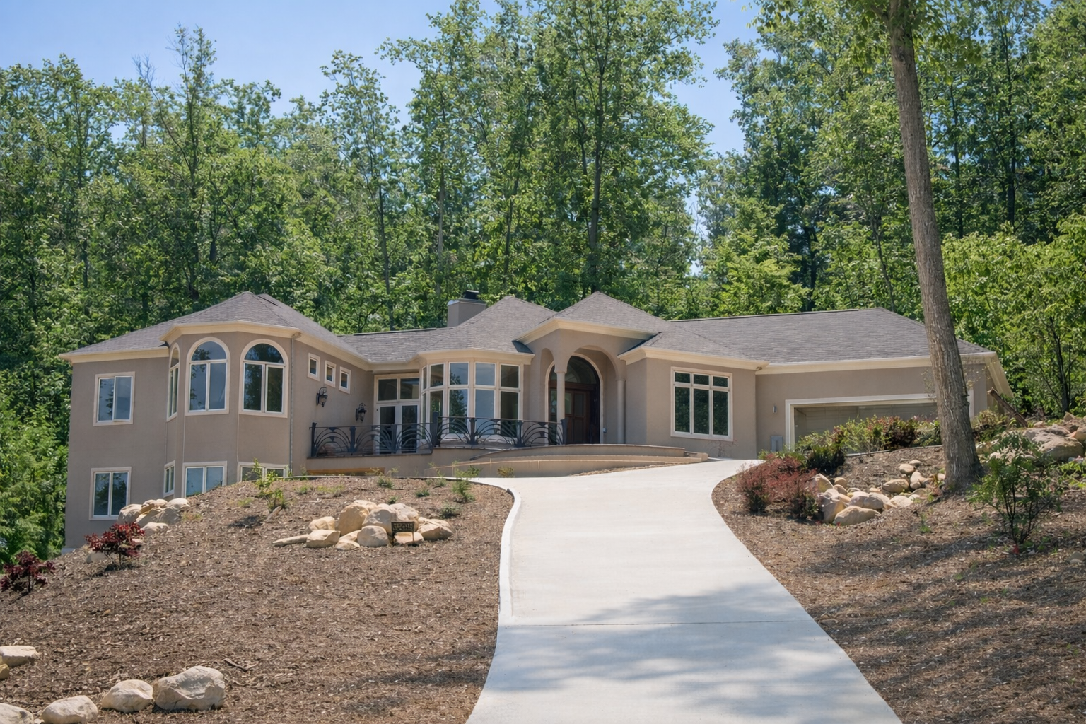 Tucked behind a long private drive on a wooded lot, this ranch was built for the kind of privacy you can still find along the American Tobacco Trail.