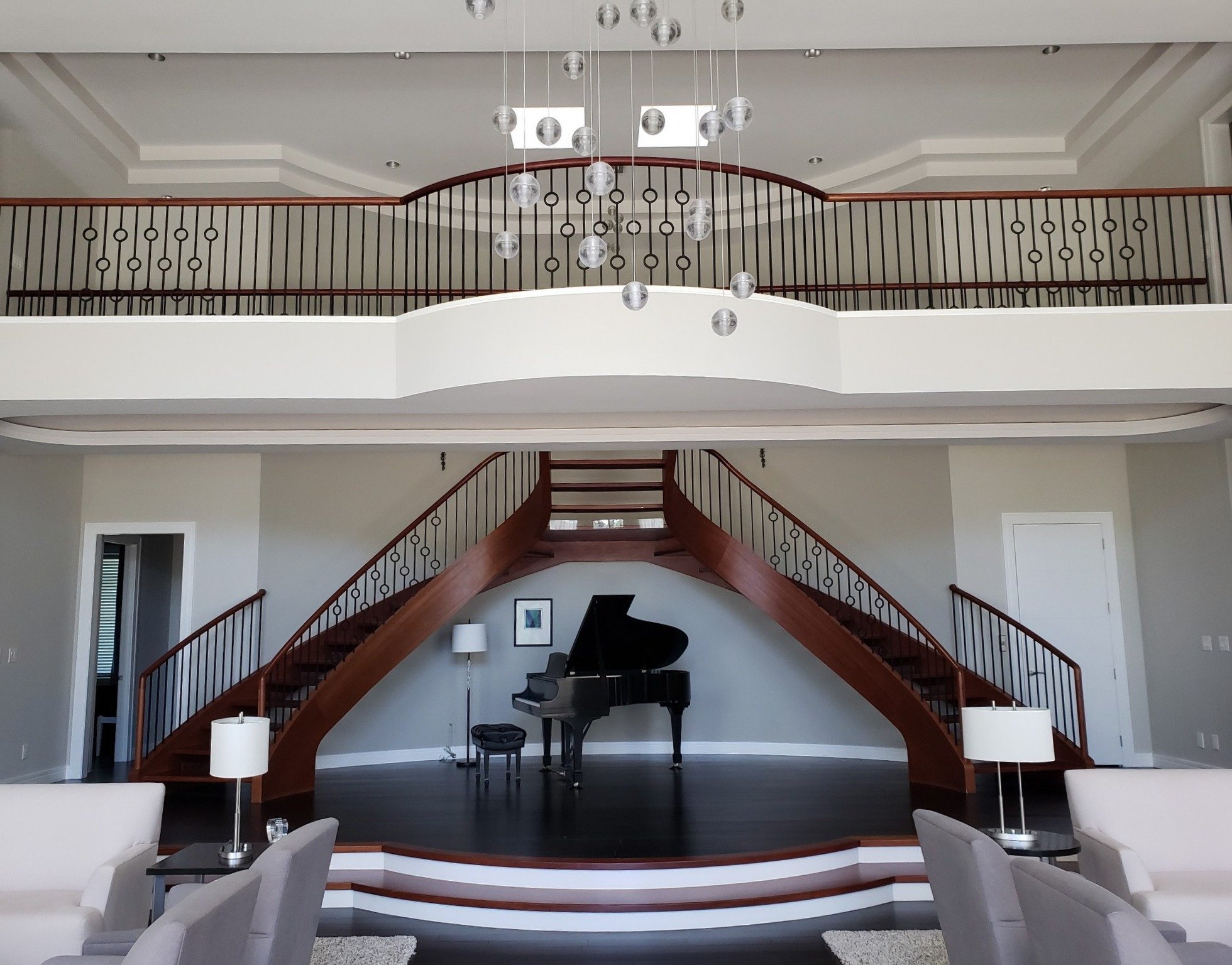This family wanted a grand, winding staircase that would leave guests talking.