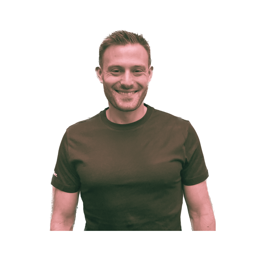 A photo of Gideon from the torso up. He is a white male with short brown hair and is wearing a brown T-shirt.