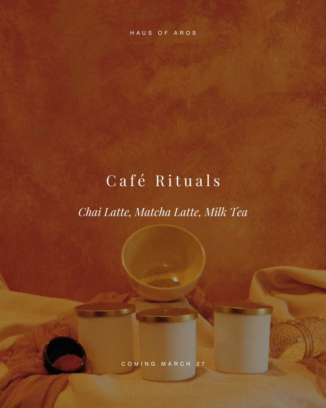 A promotional poster for Haus of Aros' café rituals, featuring three white jars with gold lids, a matching cup, and a small black container on a yellow fabric background, with text about chai latte, matcha latte, and milk tea, and a release date of March 27.