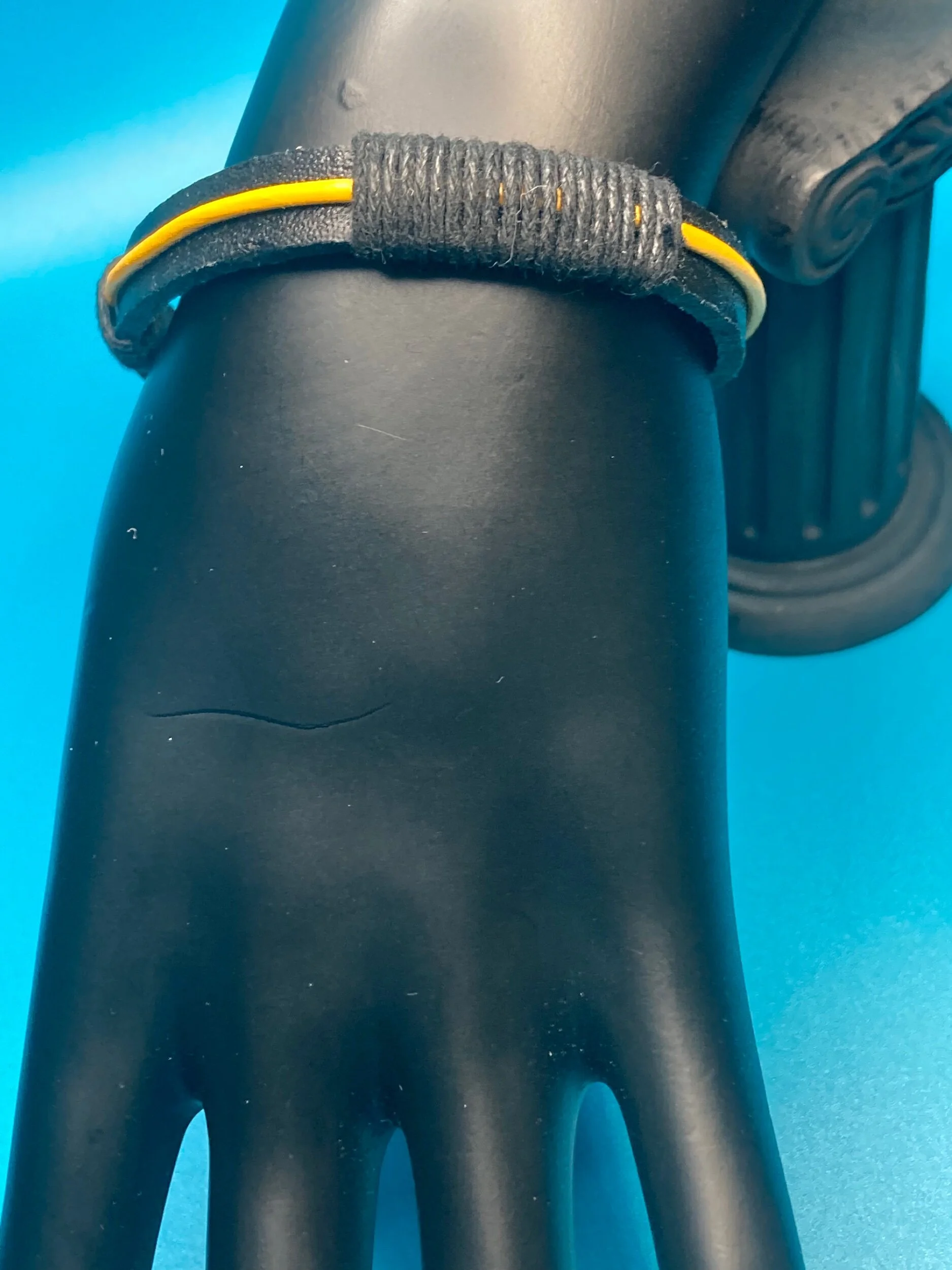 Straight Shooter Black and Yellow Leather Bracelet