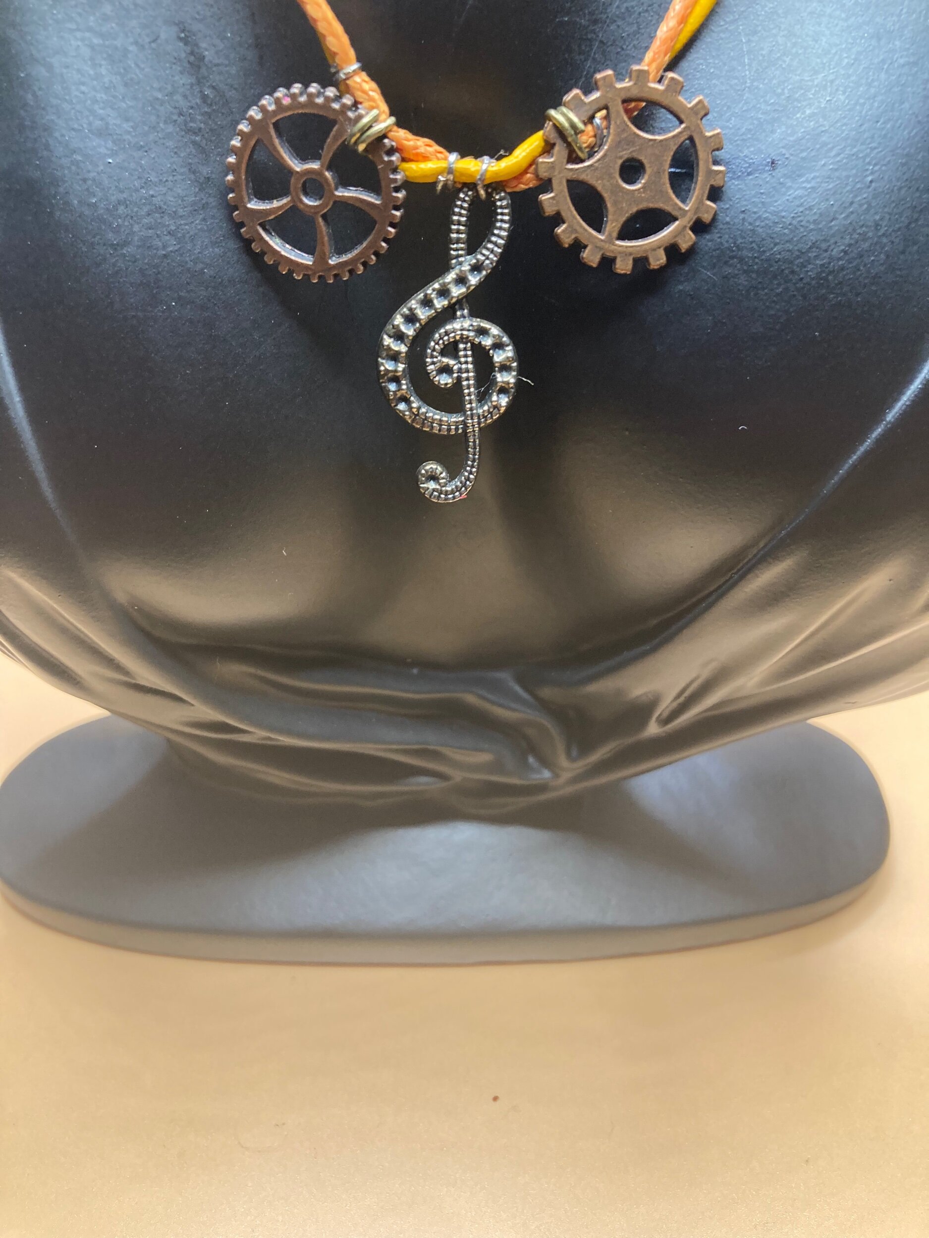 Treble Clef Watch Gear Twisted Orange Leather Necklace