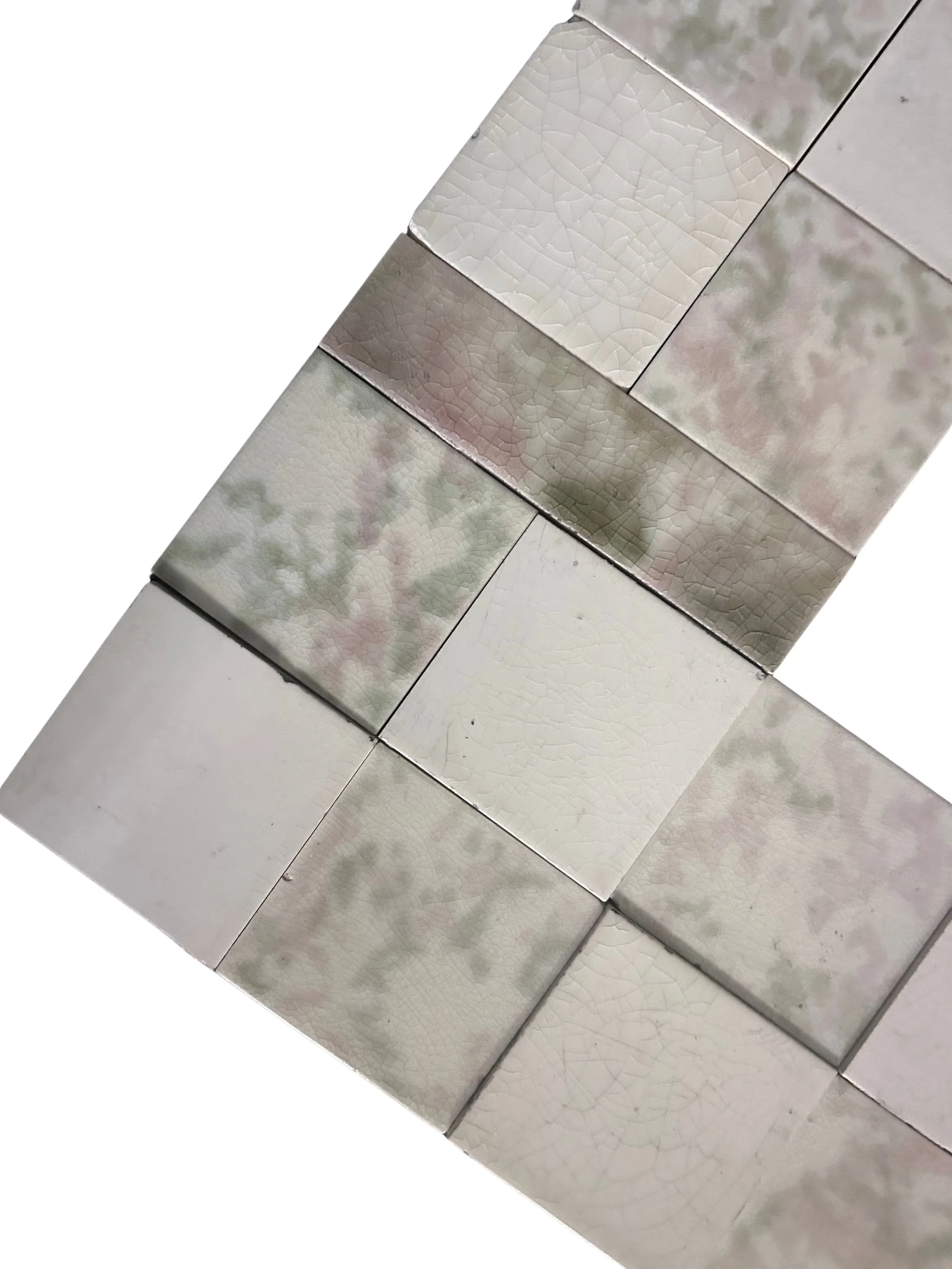 7_Untitled design.Antique Victorian fireplace surround and hearth featuring pink, green and white mottled tiles, decorative floral inserts, checkerboard design