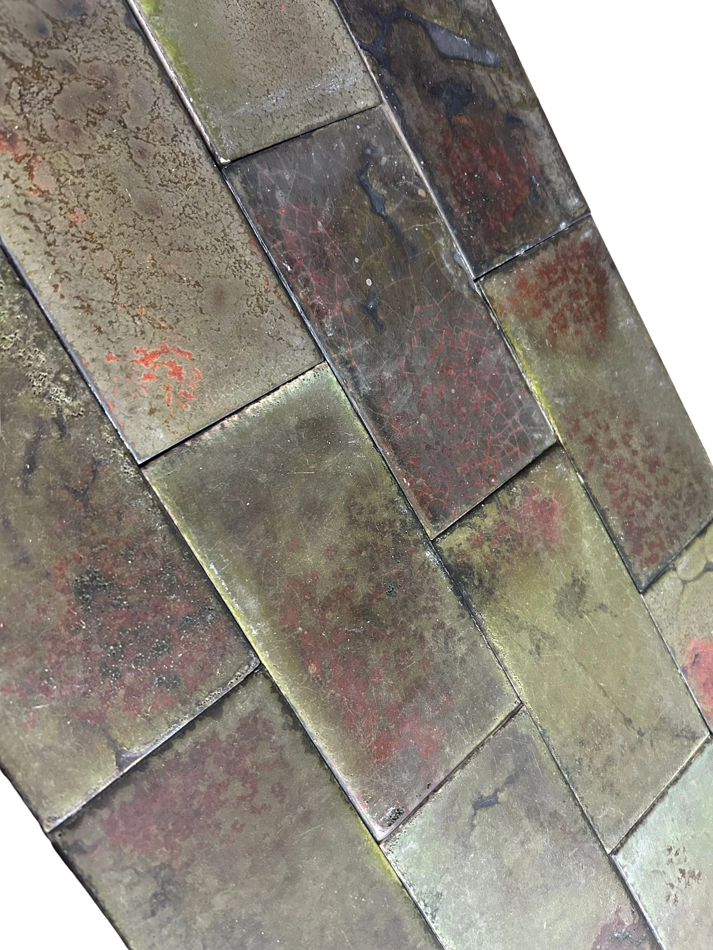 Antique Arts and Crafts Craftsman fireplace surround and hearth featuring mottled olive green, brown, and red tiles with richly varied, earthy glazes.