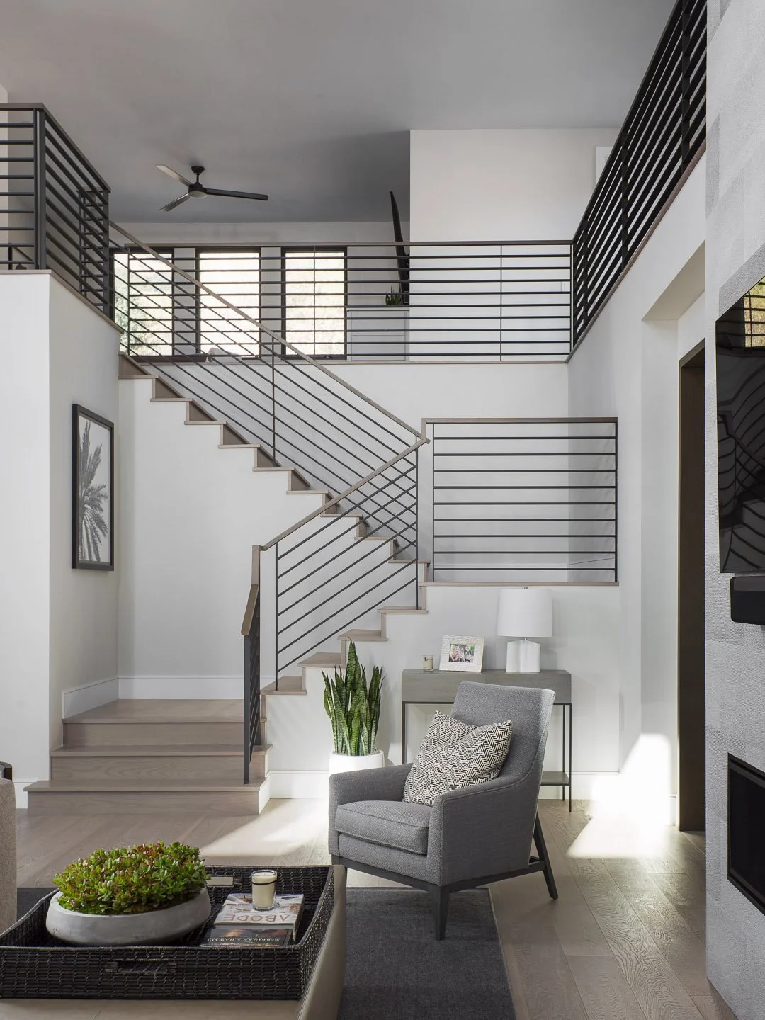 What stands out for me is how the structure repeats itself at every scale. Long sightlines, stacked windows, floating stair runs, and that quiet rhythm between wood, metal, and stone. The way the architecture organizes the space through geometry, bal