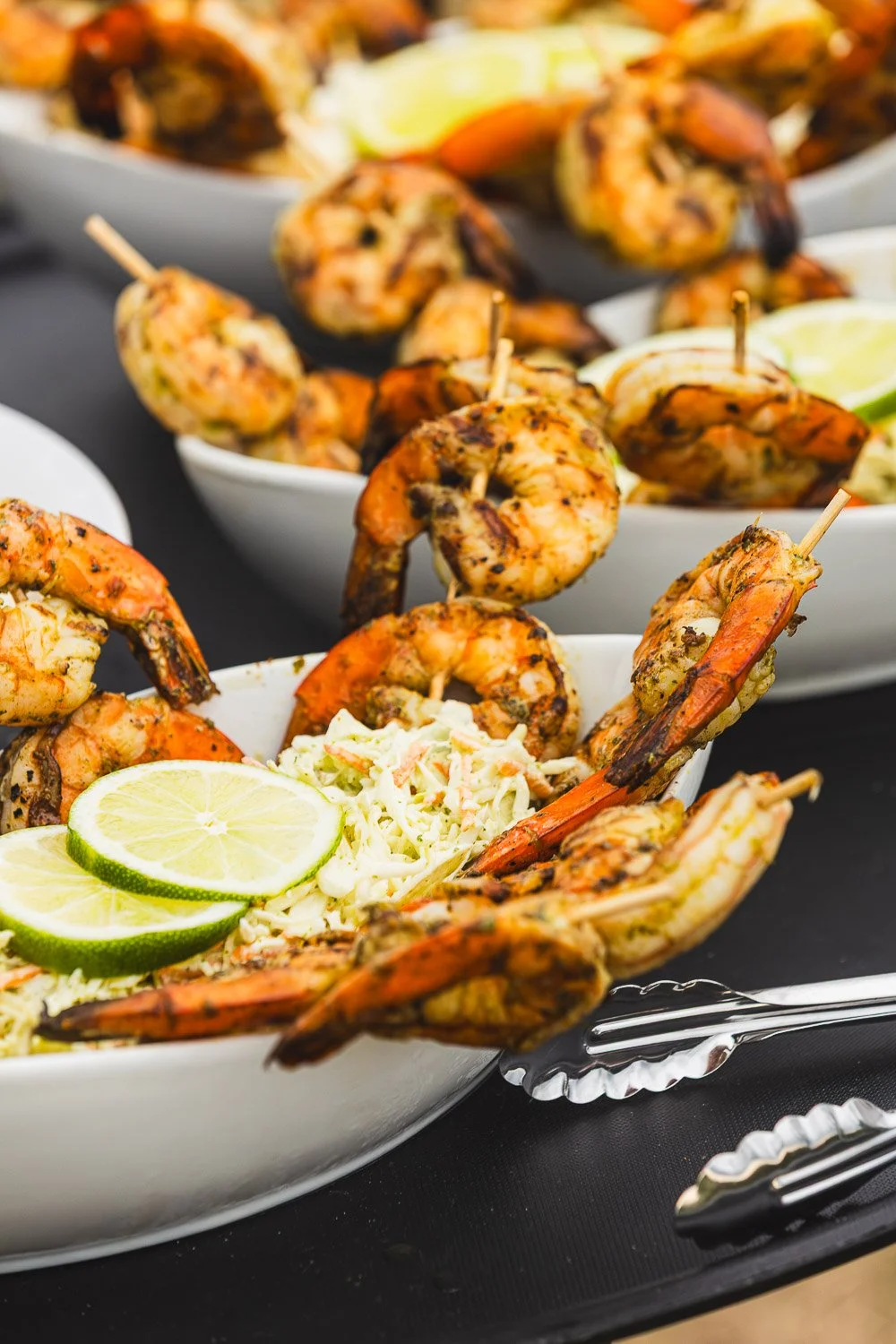 Shrimp skewers with lime and slaw served during the Street.life 2025 dinner in Portsmouth NH