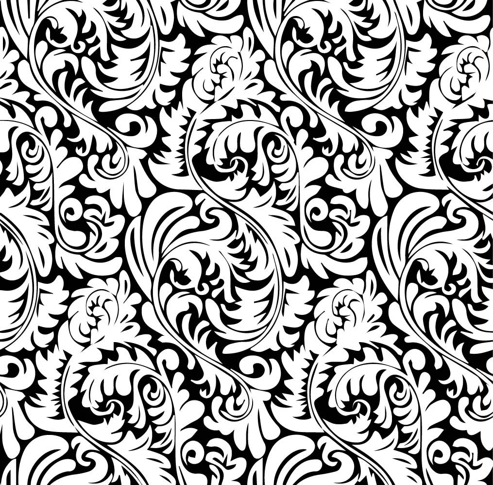 Black and white ornate floral pattern with swirling leaves and intricate designs.