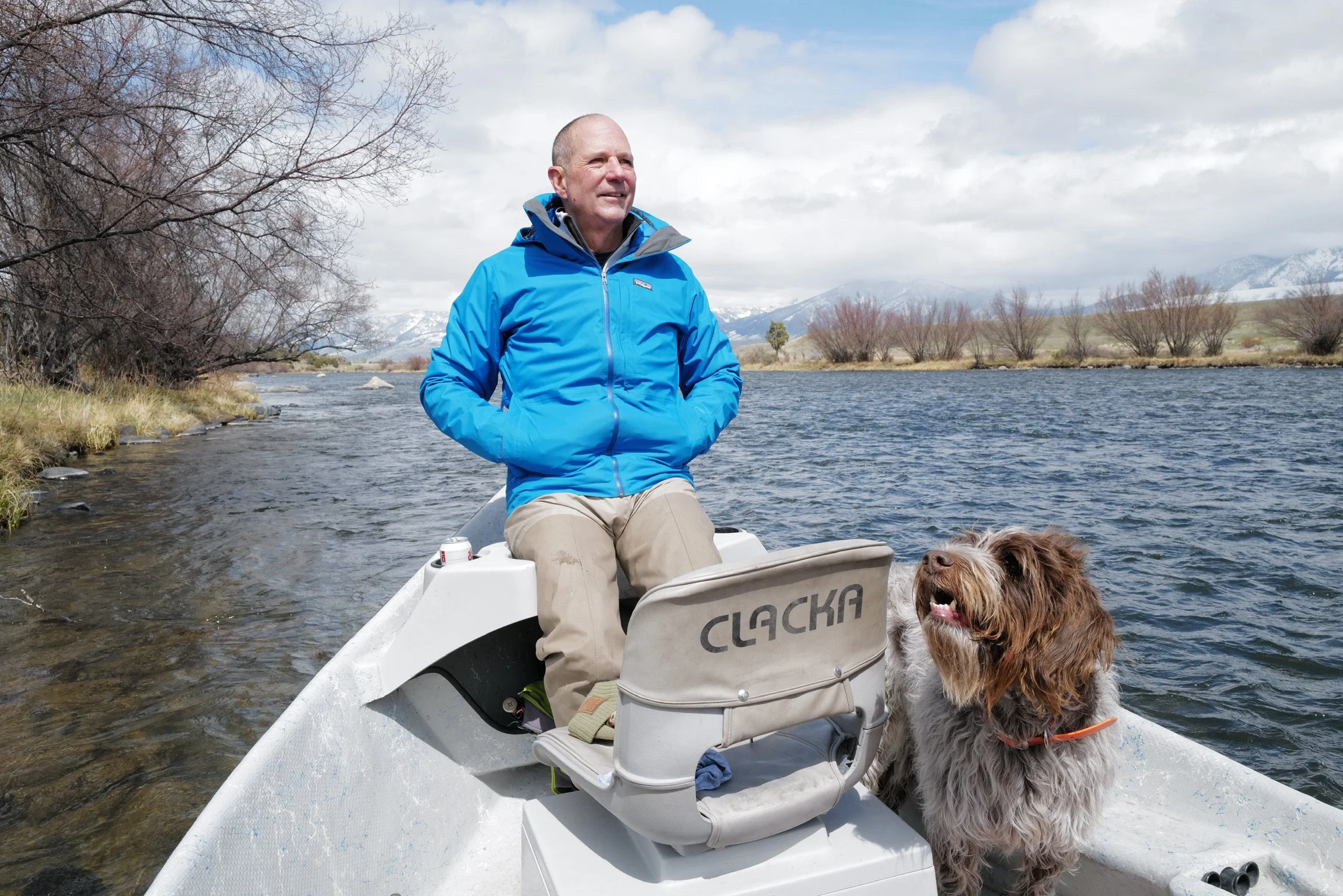 Foster Mobley on a lake in Alaska on a boat