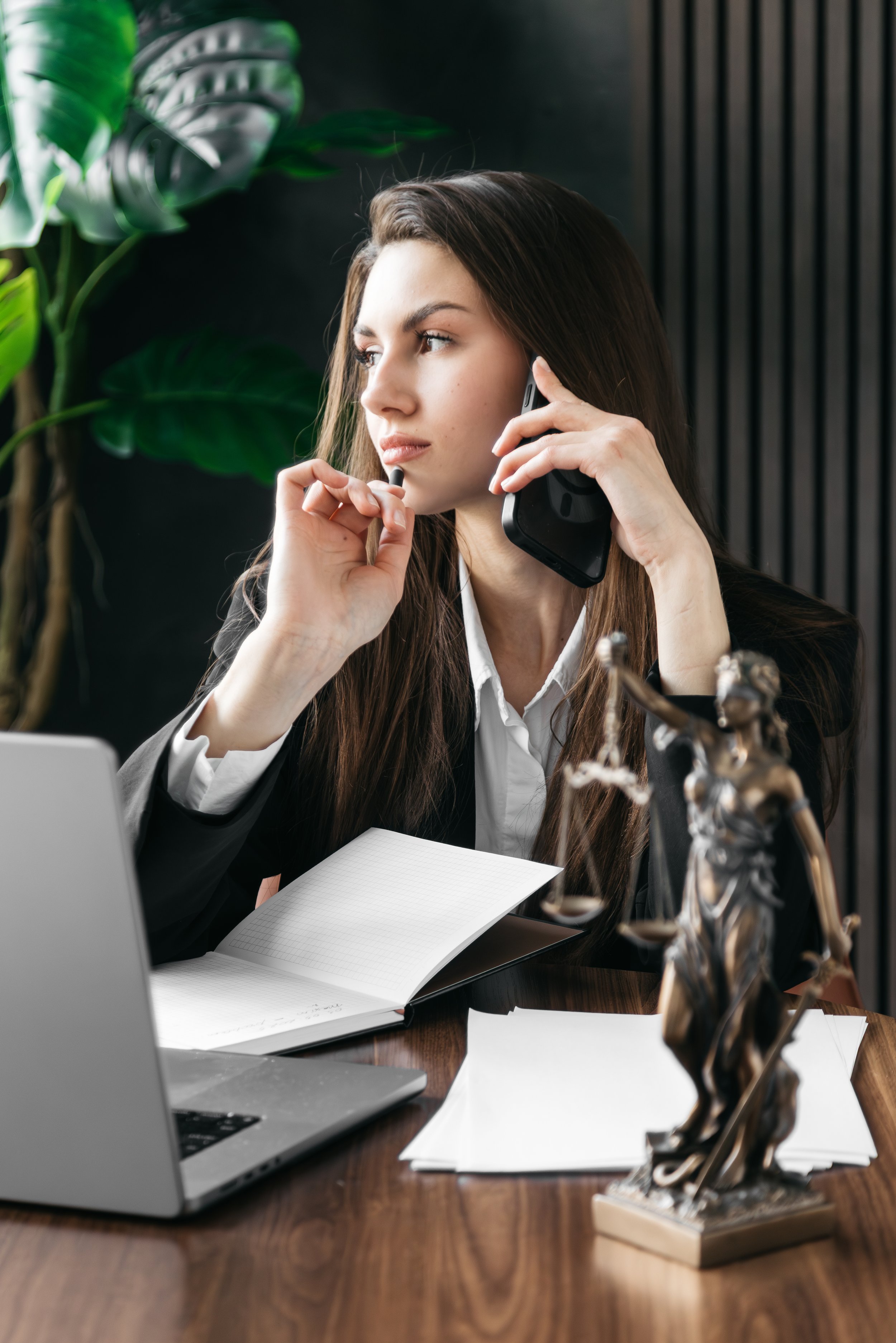 high achieving woman feeling overwhelmed on cell phone at work, therapy for high achieving women