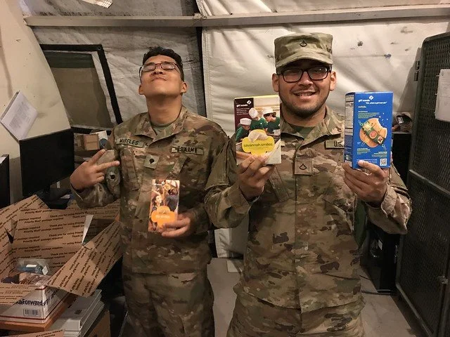 troops with girl scout cookies.jpg