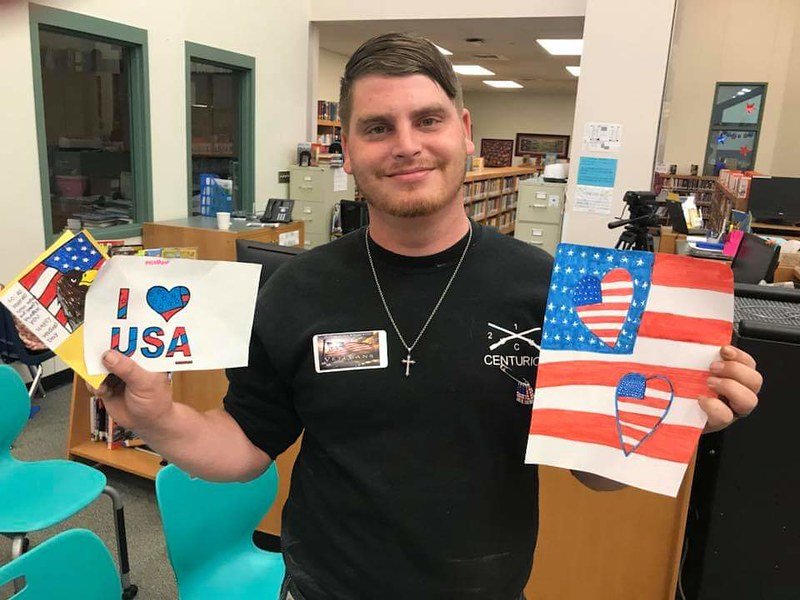 troops with cards.jpg