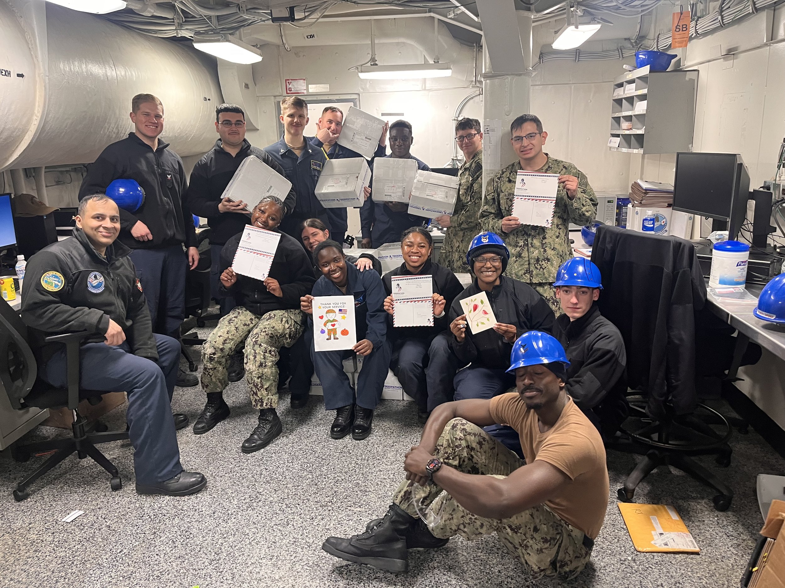 USS George Washington_Sailors with letters_packages.jpeg