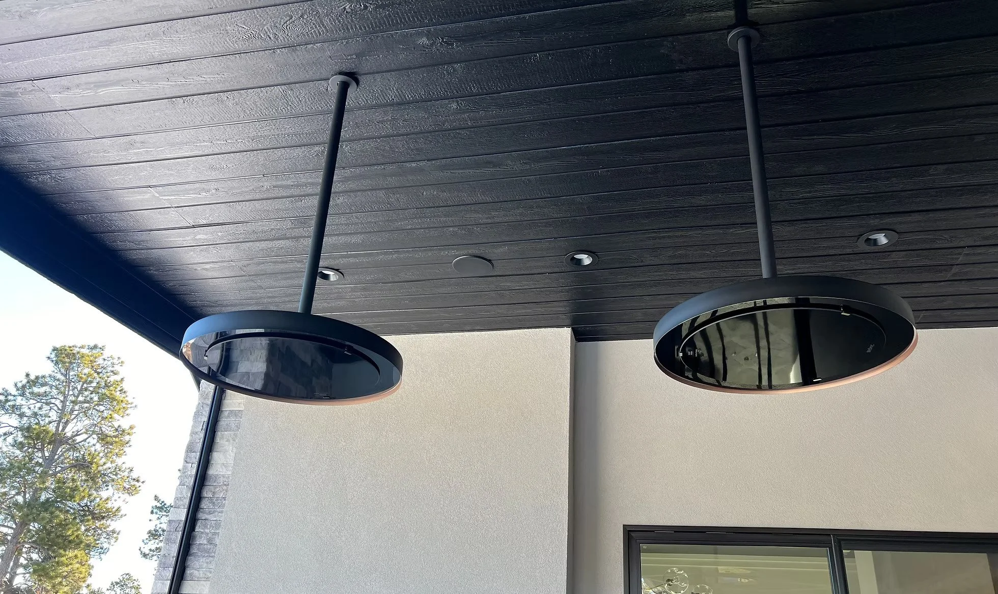 Close up of heating fixtures hanging from ceiling