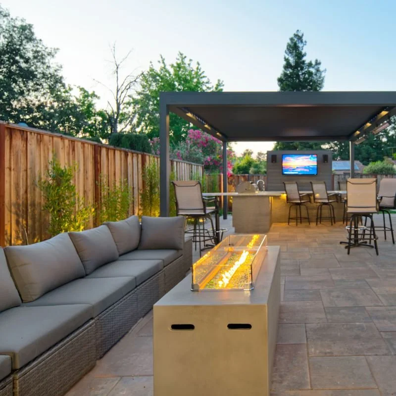 a modern outdoor fire pit and seating area