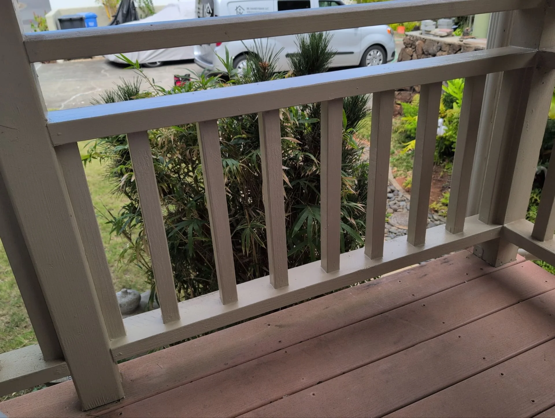 Rotted portion of deck railing removed and replaced