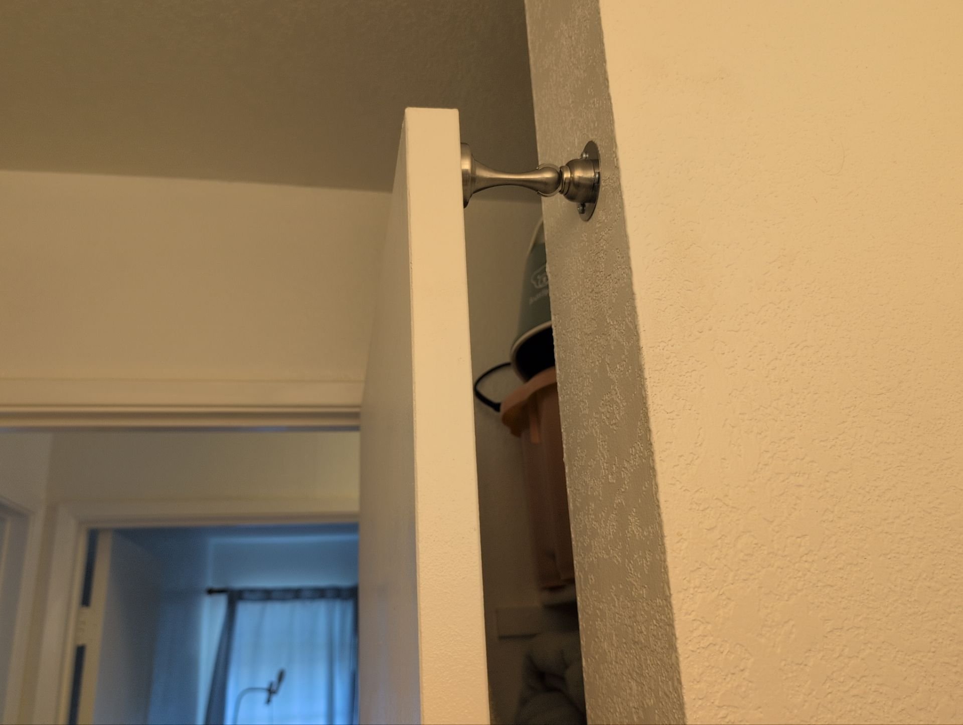 Magnetic door stopper installed