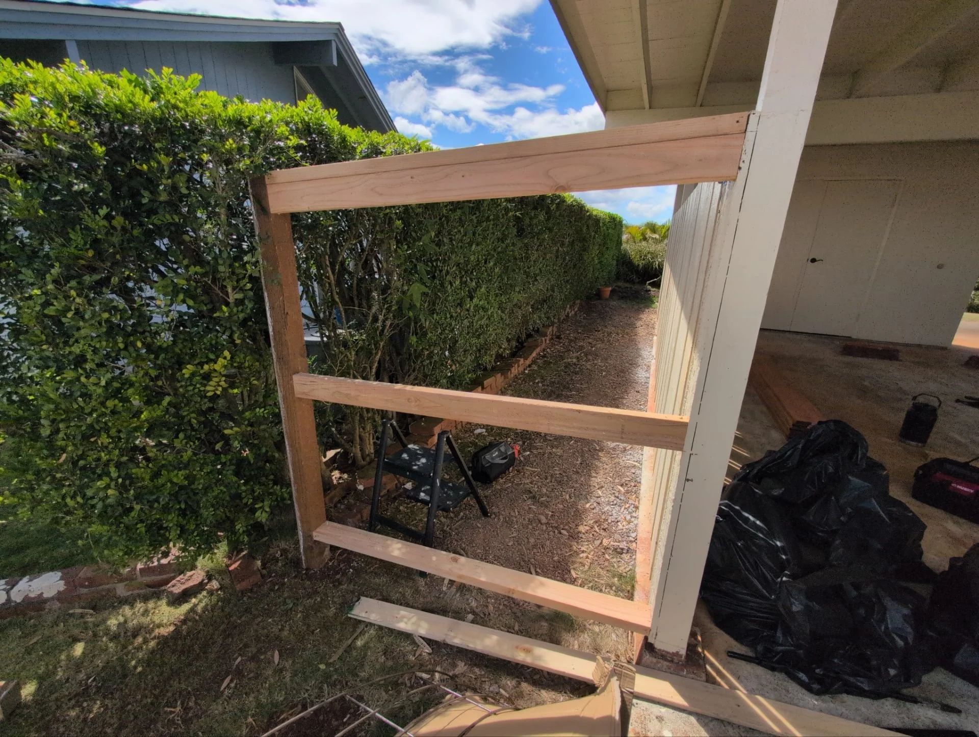 Rotted portion of fence removed / replaced