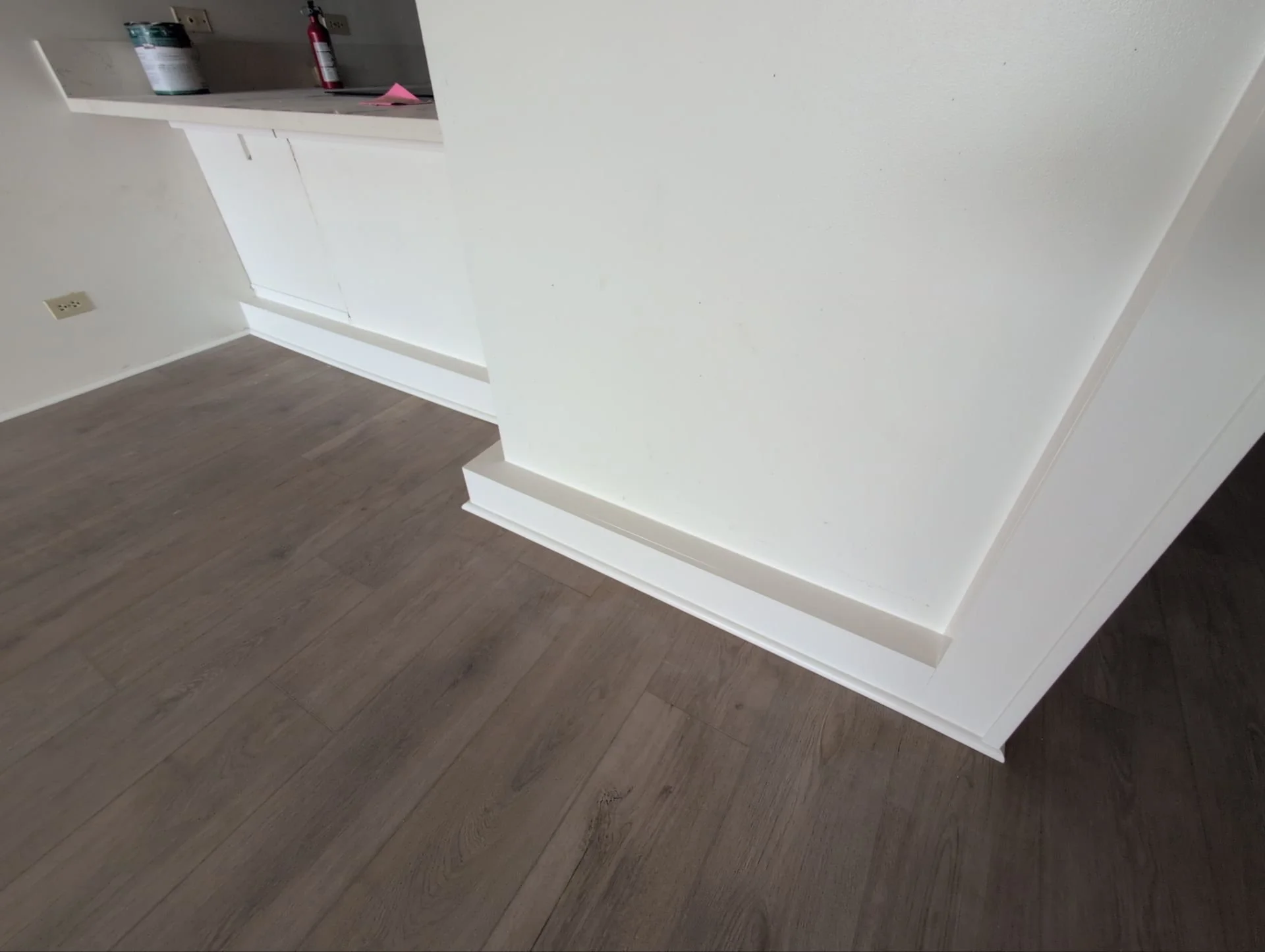 Gave this exposed plumbing a decorative makeover using various trim wood plus 2 coats of color-matched paint