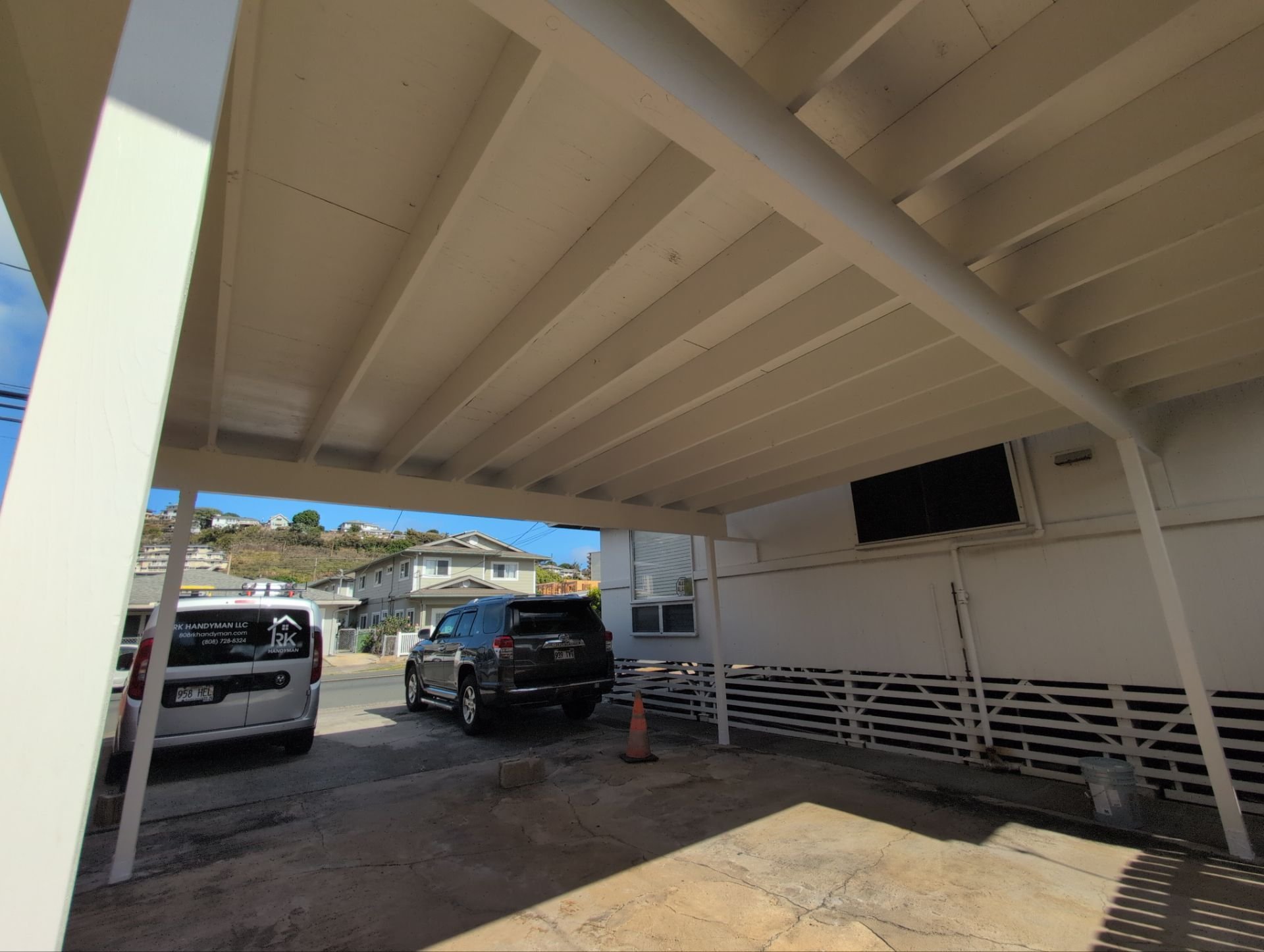 Two coats of paint on this newly built carport