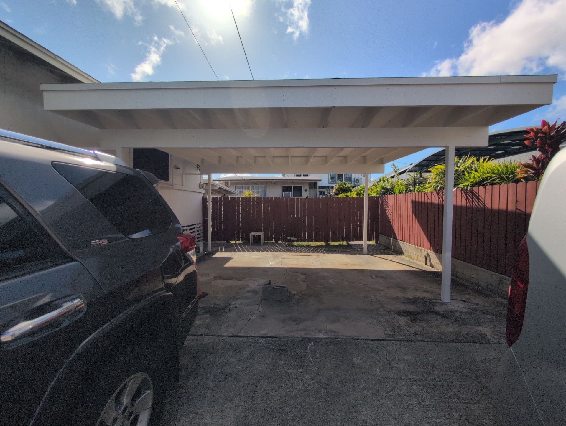 Two coats of paint on this newly built carport