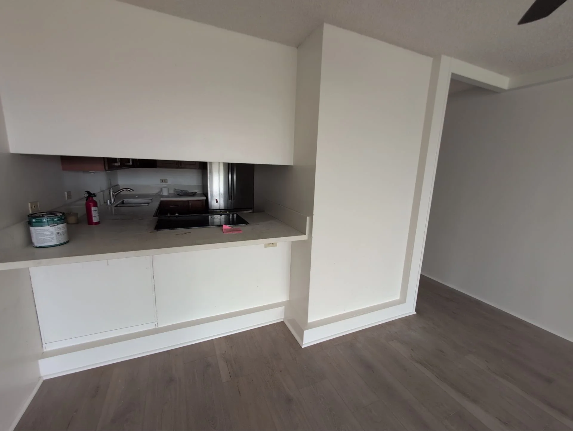 Gave this exposed plumbing a decorative makeover using various trim wood plus 2 coats of color-matched paint