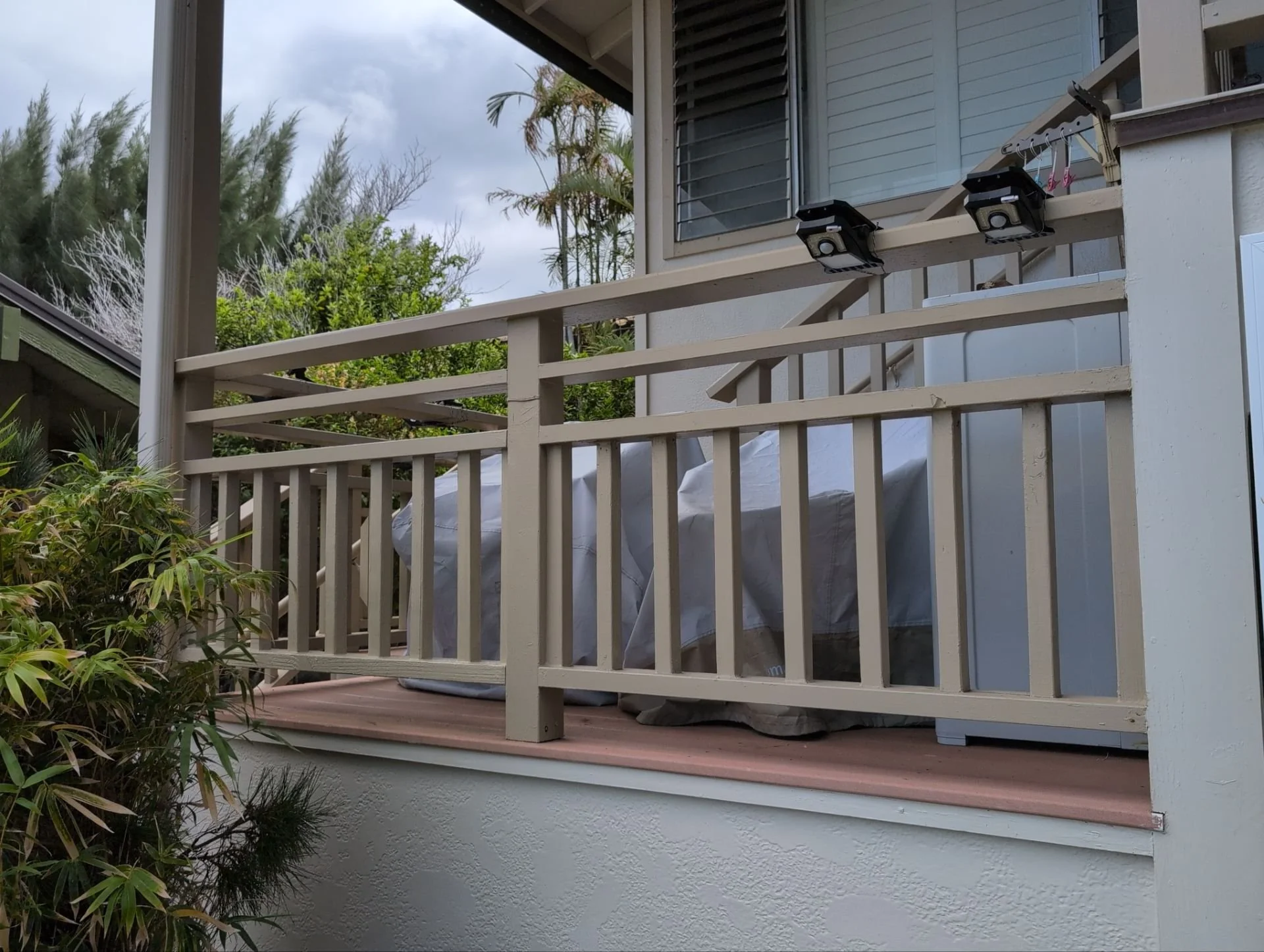 Rotted portion of deck railing removed and replaced