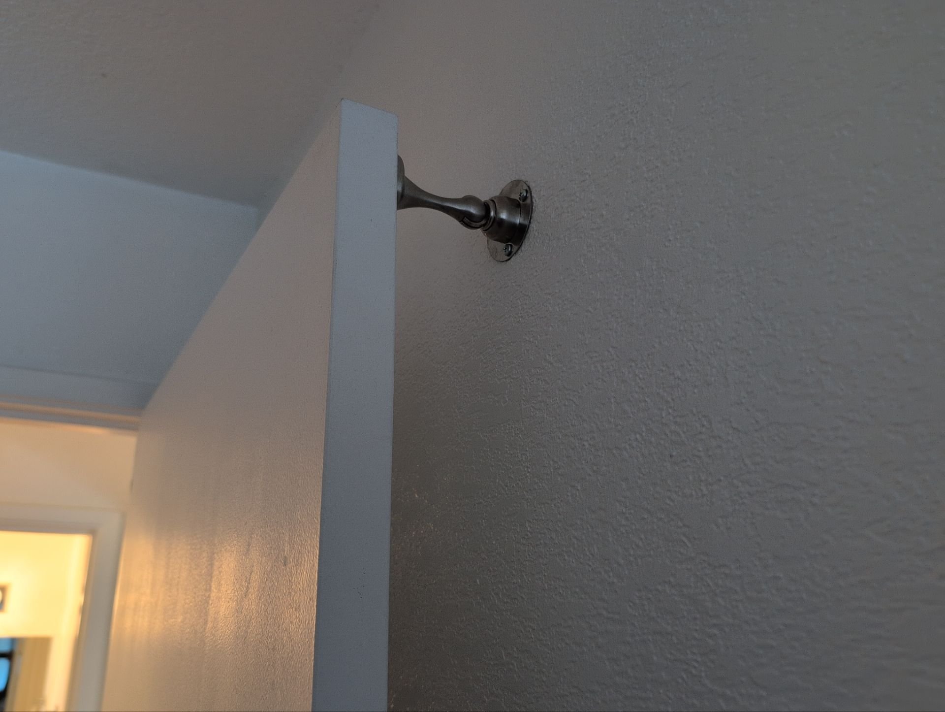 Magnetic door stopper installed