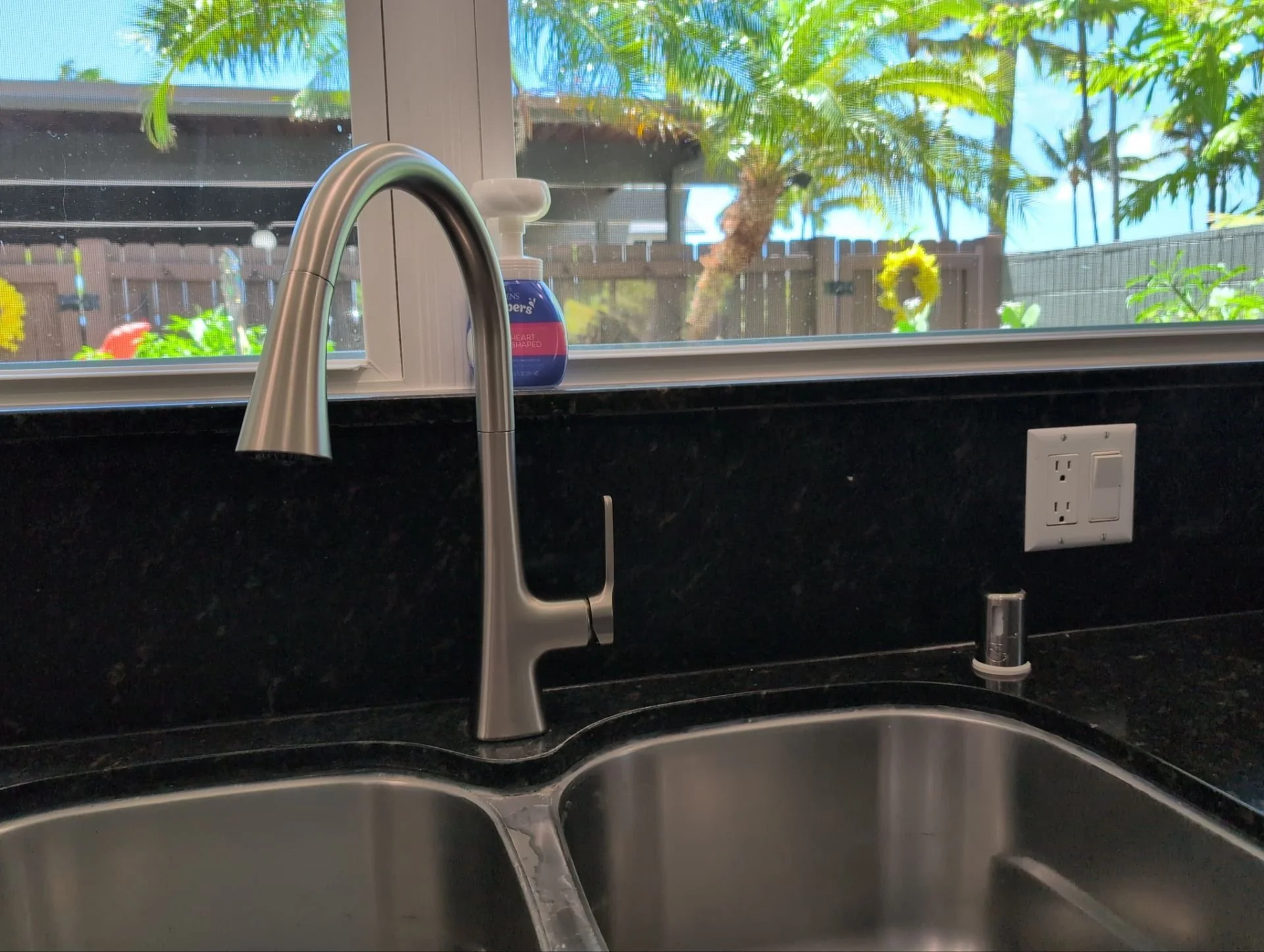 Kitchen faucet replaced / air gap installed and connected from dishwasher to garbage disposal