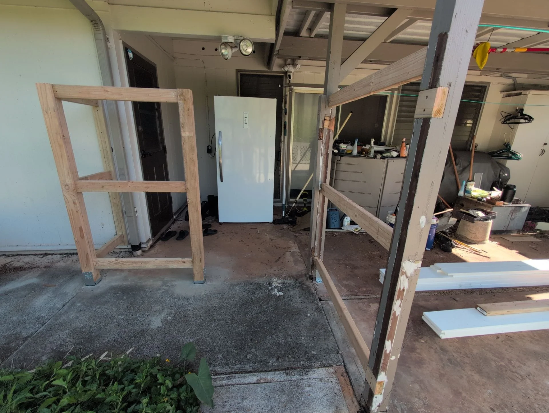Wooden fence rebuilt using pressure treated lumber, PVC slats / top cap, plus primer & 2 coats of paint