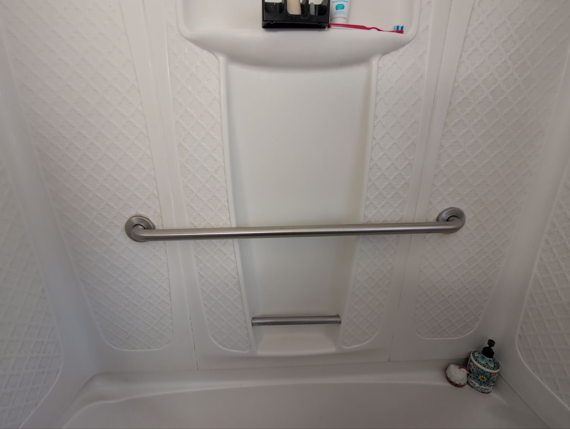 New shower grab bar installed