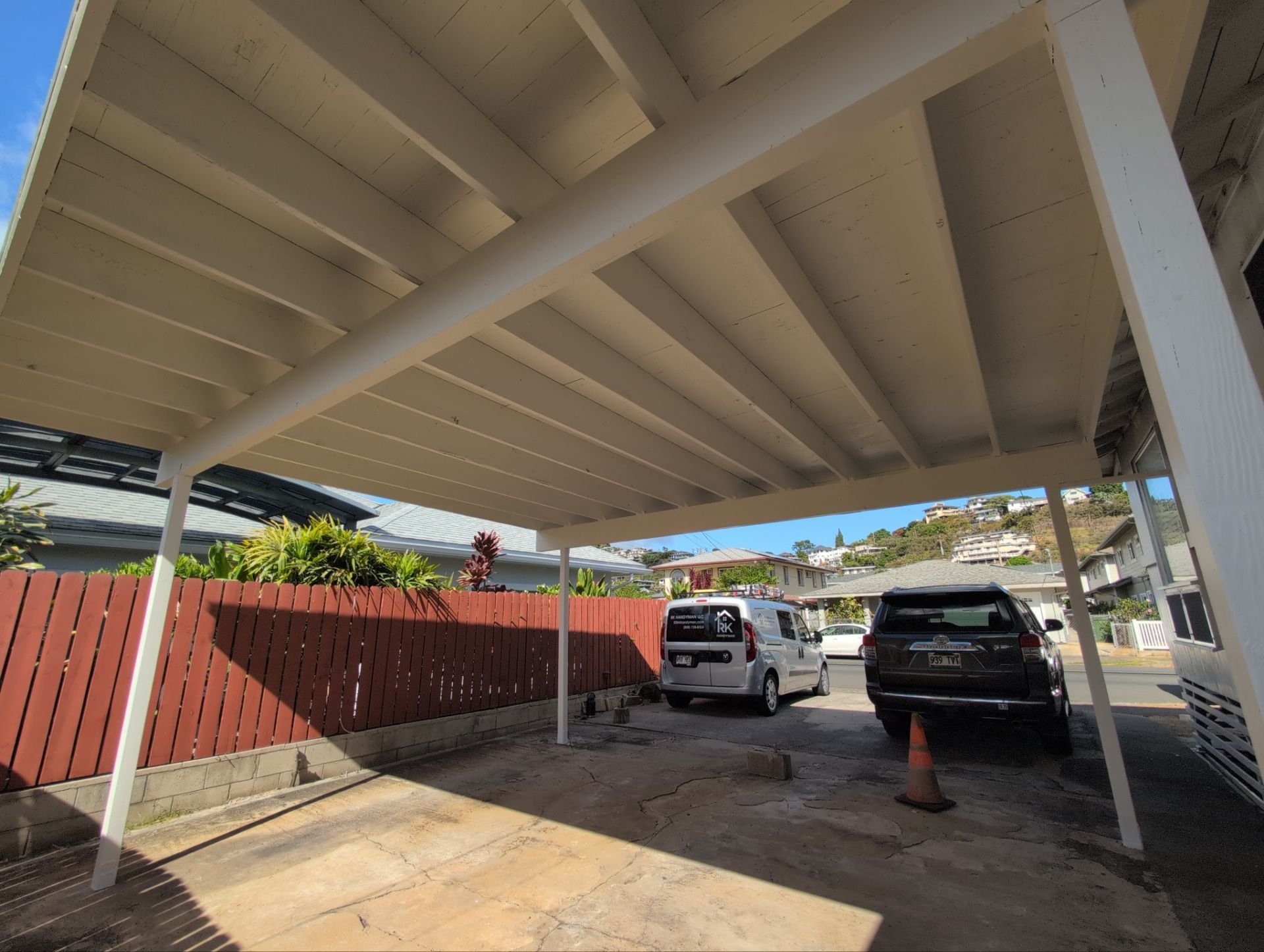 Two coats of paint on this newly built carport