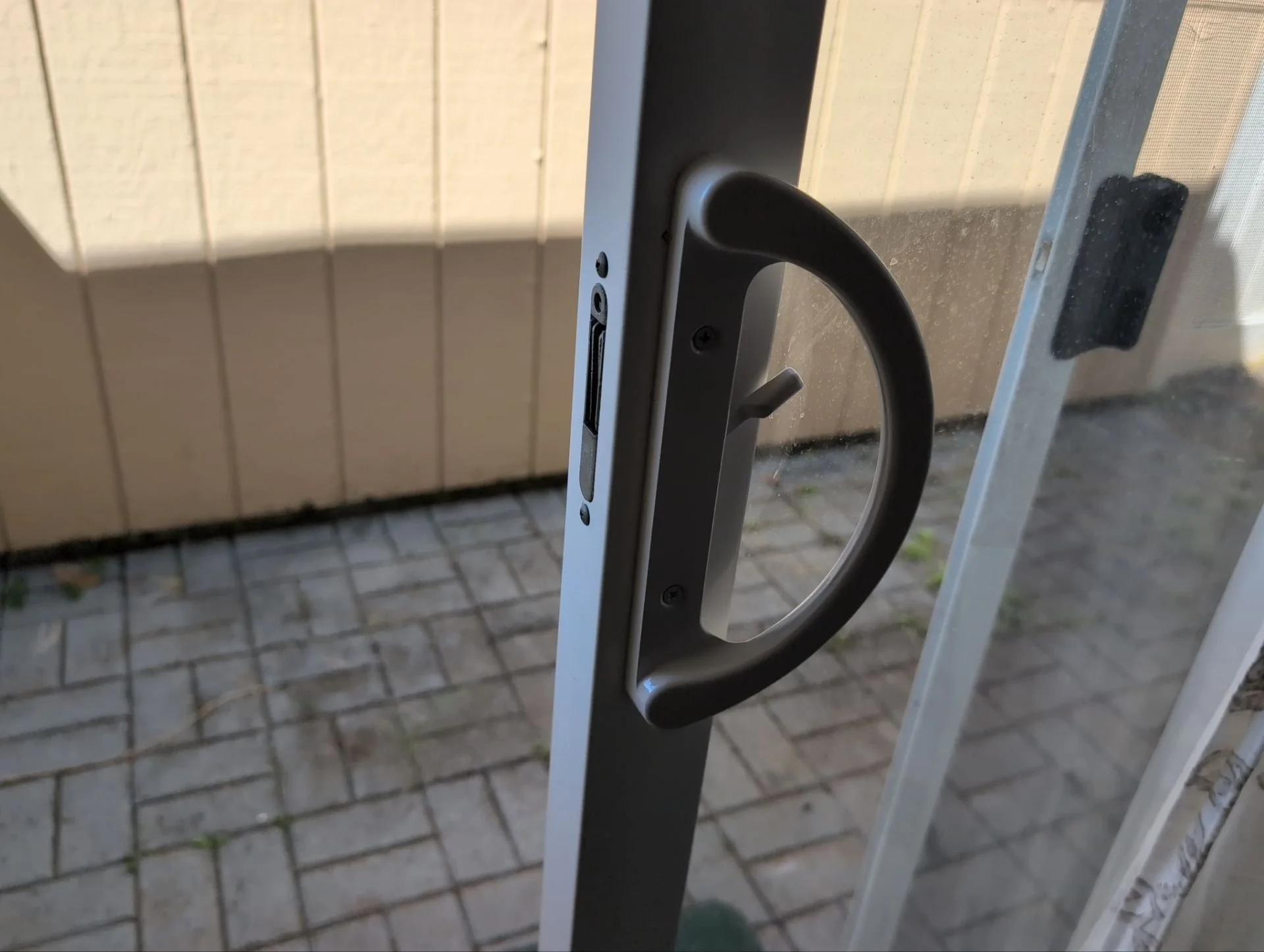 Sliding glass door handle replaced
