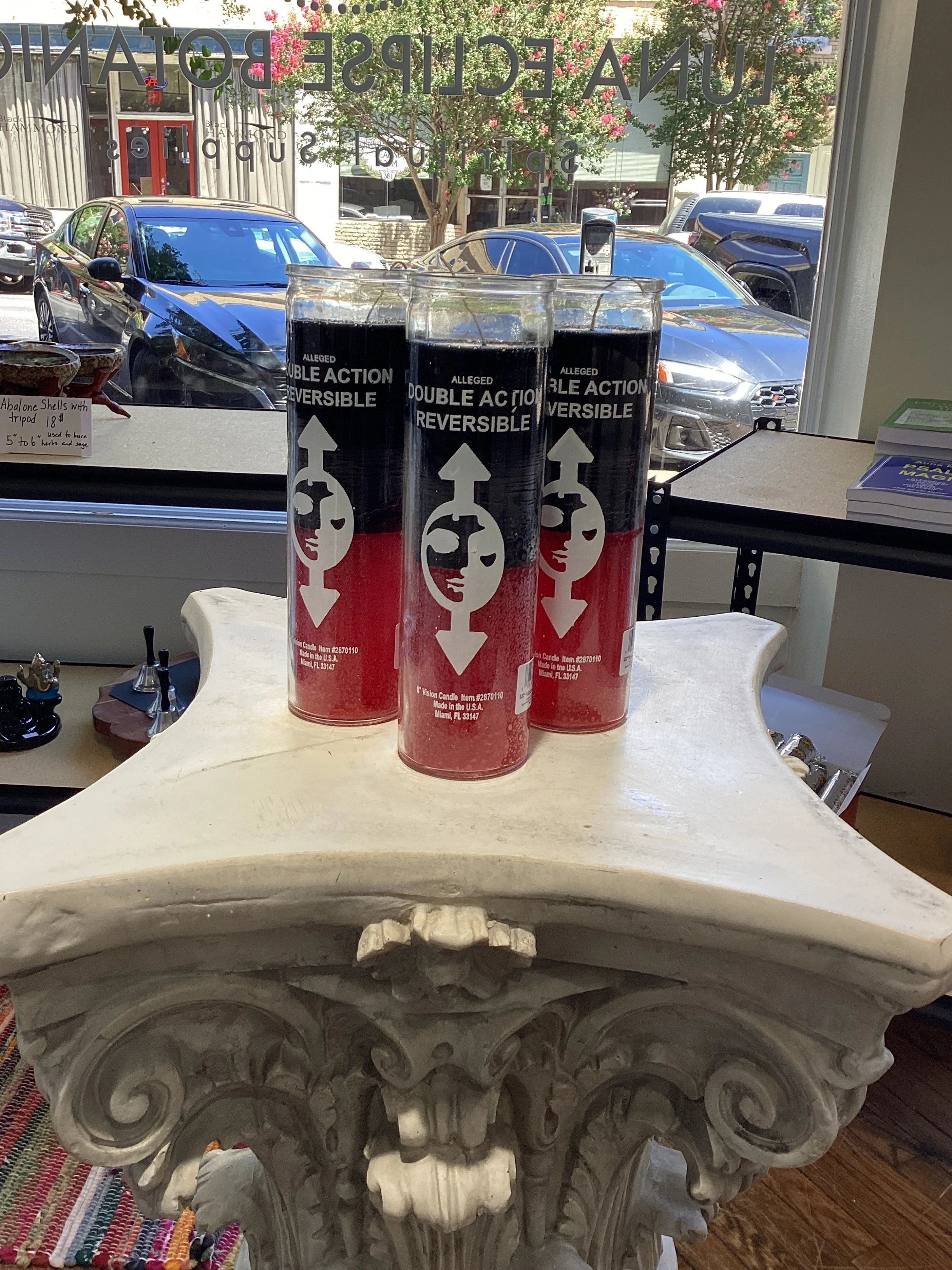 Black and red reversible candle